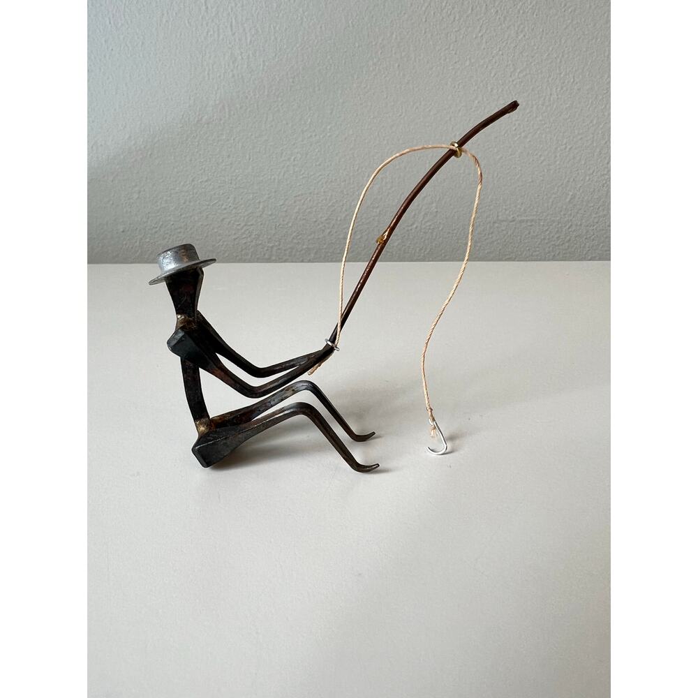 Handcrafted Metal Fishing Figure Sculpture Art made from Recycled Materials